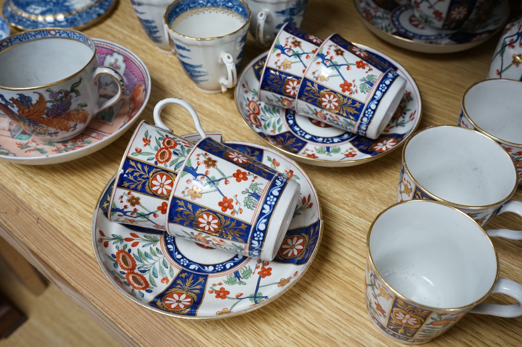 A group of late 18th century Worcester kakiemon pattern tea and coffee wares together with Worcester and Caughley Willow type pattern blue and white coffee ware